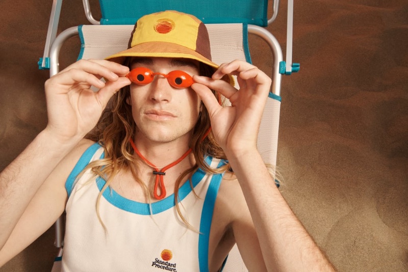 Sam Mallos sports a tank and bucket hat from the Zara x Standard Procedure capsule collection. 