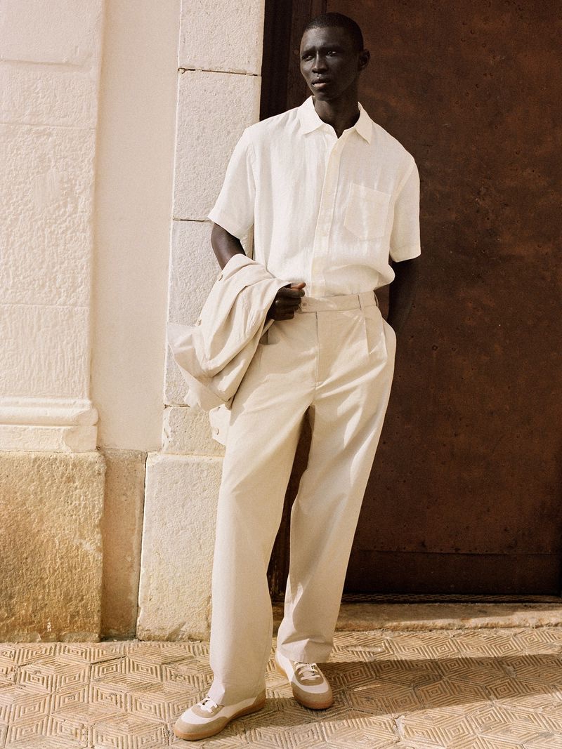 Portuguese model Fernando Cabral is a chic vision in light-colored tailoring by ARKET.