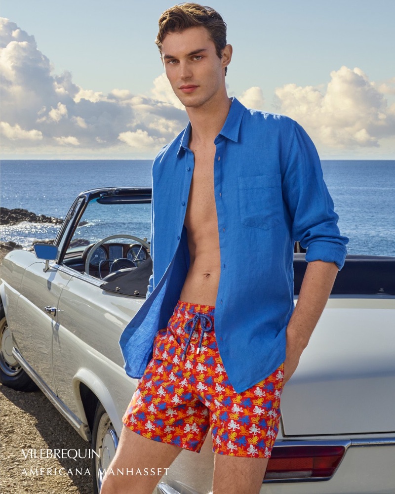 British model Kit Butler sports a linen shirt and swim shorts from Vilebrequin.