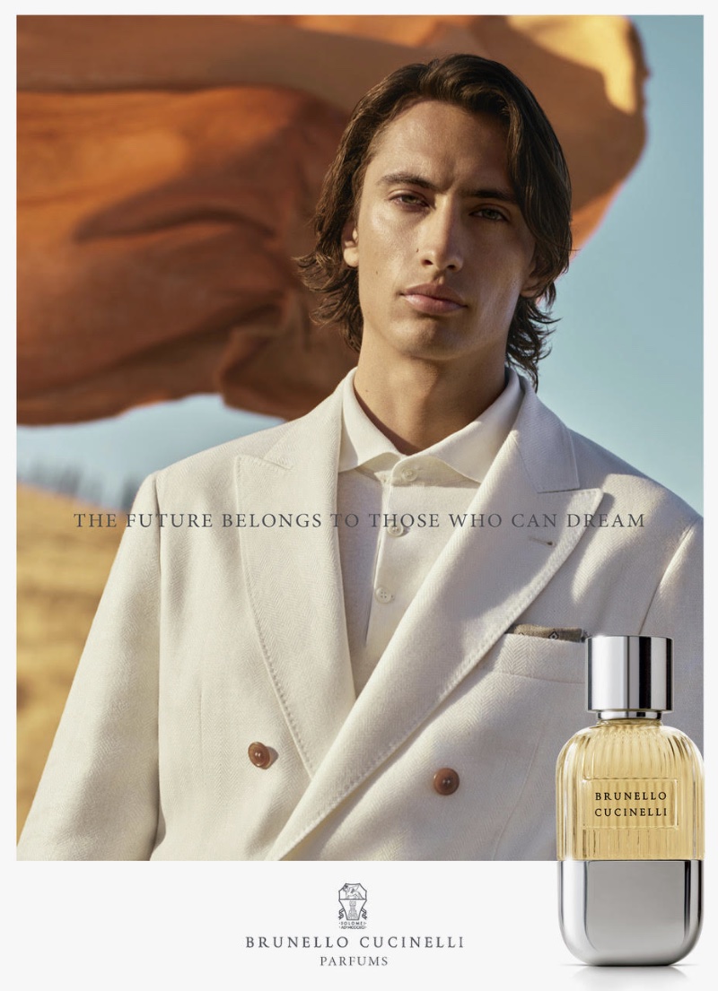Donning a double-breasted jacket, James Turlington fronts the Brunello Cucinelli Parfums campaign.