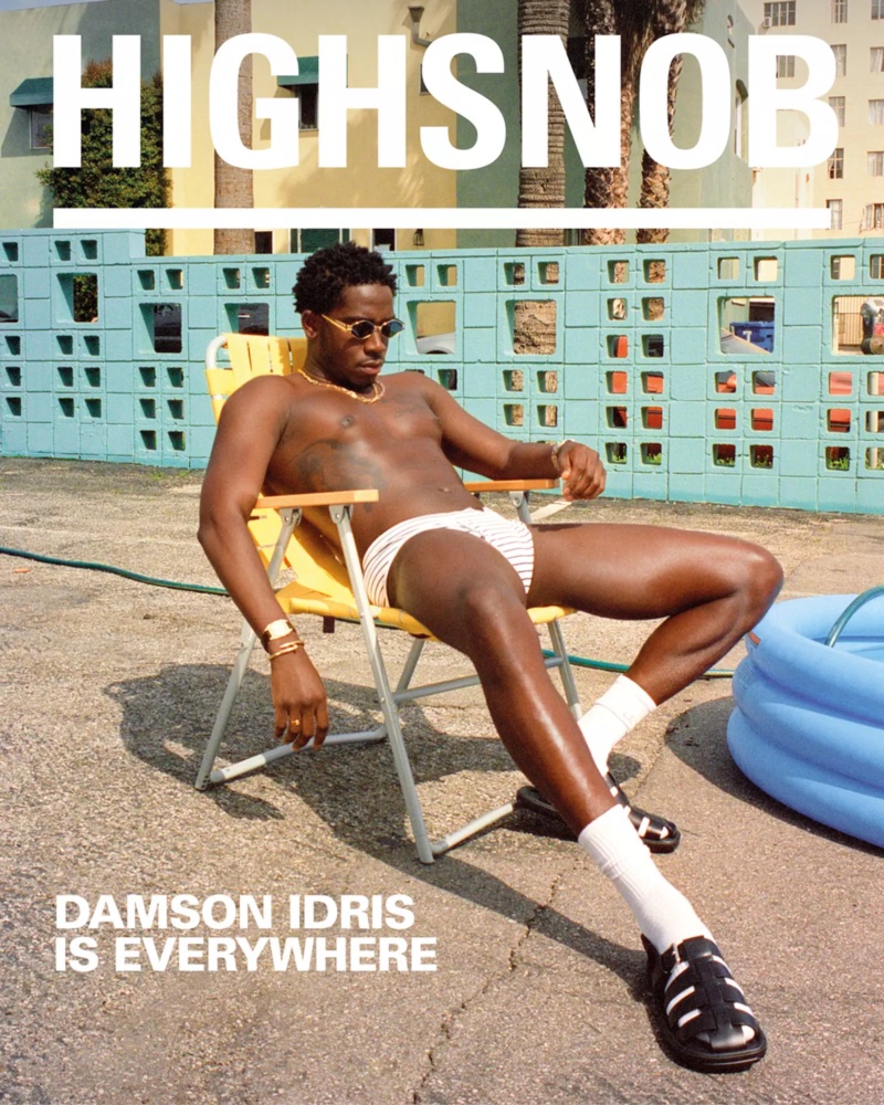 Damson Idris covers Highsnobiety in Prada briefs and sandals, Celine jewelry, a Cartier watch, and Calvin Klein socks.
