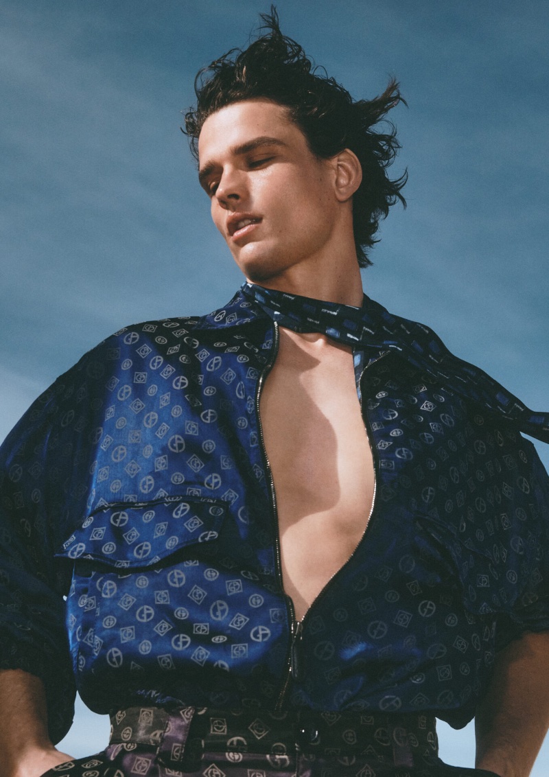 Simon Nessman rocks a monogram outfit for the Giorgio Armani Mare spring-summer 2023 campaign.