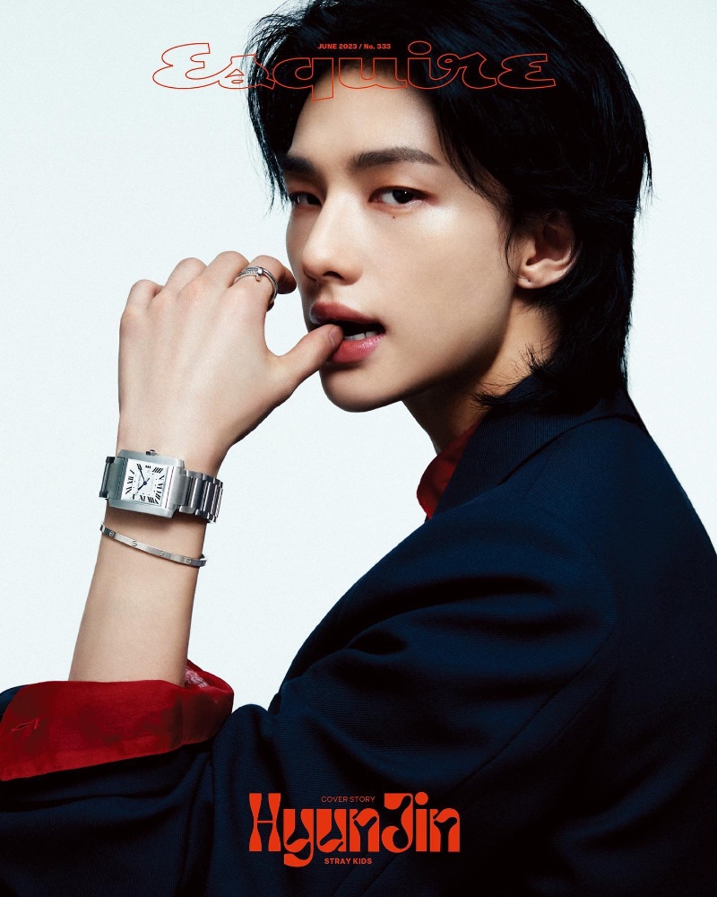 Hyunjin dons a Wooyoungmi suit jacket with a Cartier Tank Française watch, white gold love bracelet, and Juste un Clou ring for the June 2023 cover of Esquire Korea.