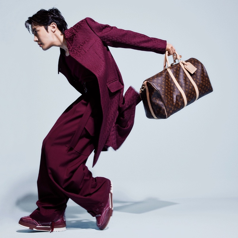 J-Hope sports a burgundy LV monogram coat with oversized cargo pants as he takes hold of a Louis Vuitton monogram keepall for the brand's newest advertising campaign. » J-Hope Fronts Louis Vuitton Keepall Campaign J-Hope sports a burgundy LV monogram coat with oversized cargo pants as he takes hold of a Louis Vuitton monogram keepall for the brand's newest advertising campaign.