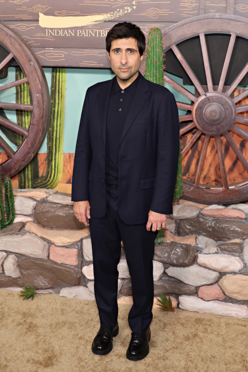 Jason Schwartzman poses for pictures at the New York premiere of Asteroid City.