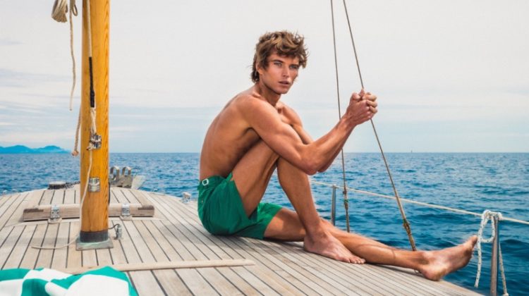 Jordan Barrett connects with Orlebar Brown, collaborating on a capsule collection, including the brand's Bulldog mid-length swim shorts in kale tonic.