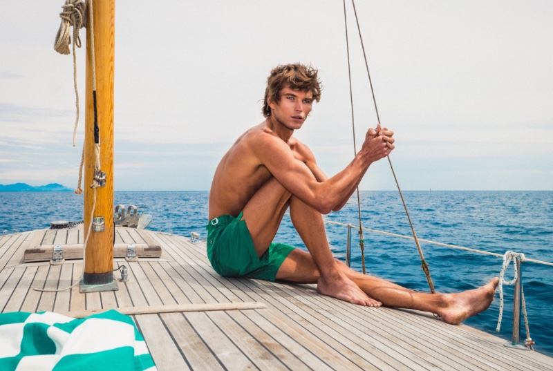 Jordan Barrett connects with Orlebar Brown, collaborating on a capsule collection, including the brand's Bulldog mid-length swim shorts in kale tonic.