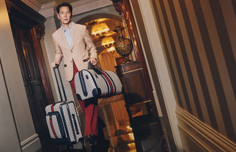Gucci global brand ambassador Jungjae Lee fronts the fashion house's new Valigeria campaign. 