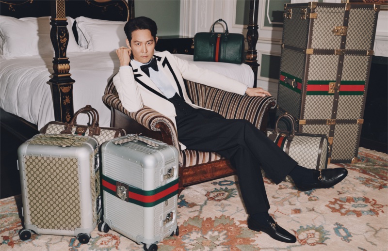 Donning sharp eveningwear, Jungjae Lee stars in the Gucci Valigeria campaign. 