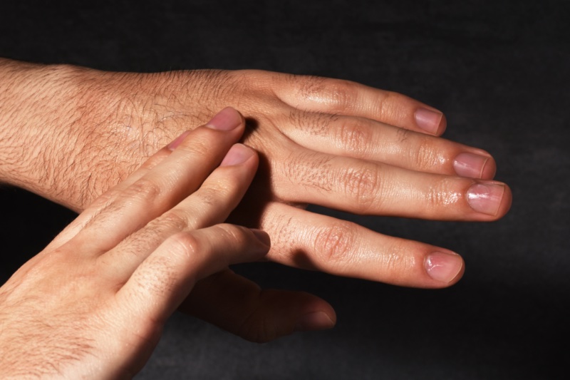 Man Moisturizing Hands