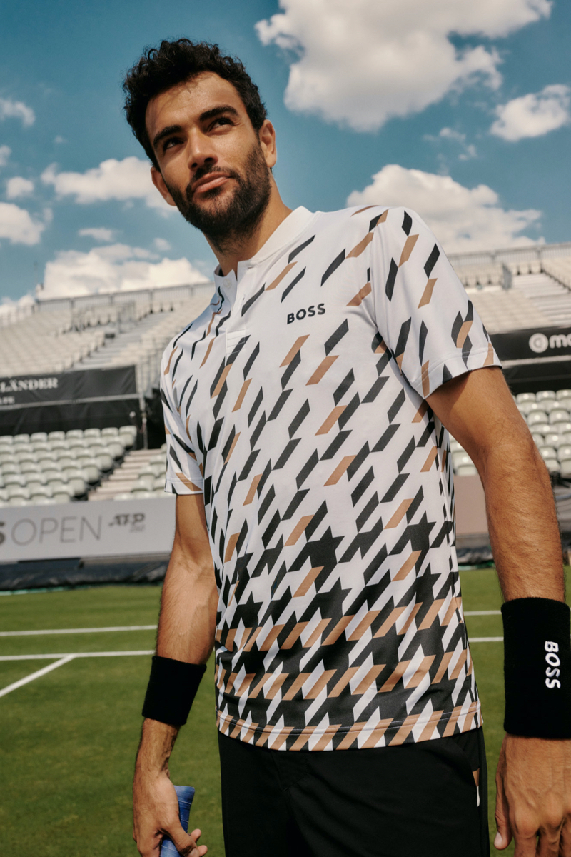 Matteo Berrettini sports a slim-fit houndstooth polo shirt and stretch poplin shorts from his BOSS capsule collection.