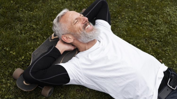 Mature Man Outside Longboard Skateboard