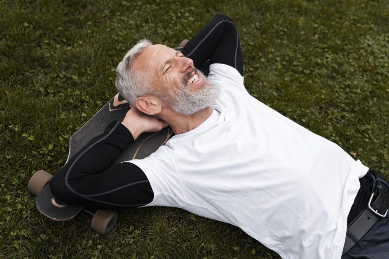 Mature Man Outside Longboard Skateboard