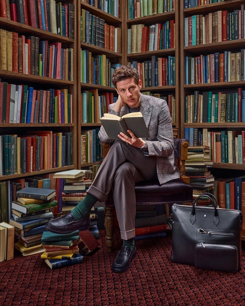 Actor James Norton is pictured alongside the Montblanc Meisterstück Selection Soft 24/7 Bag for the brand's The Library Spirit campaign.