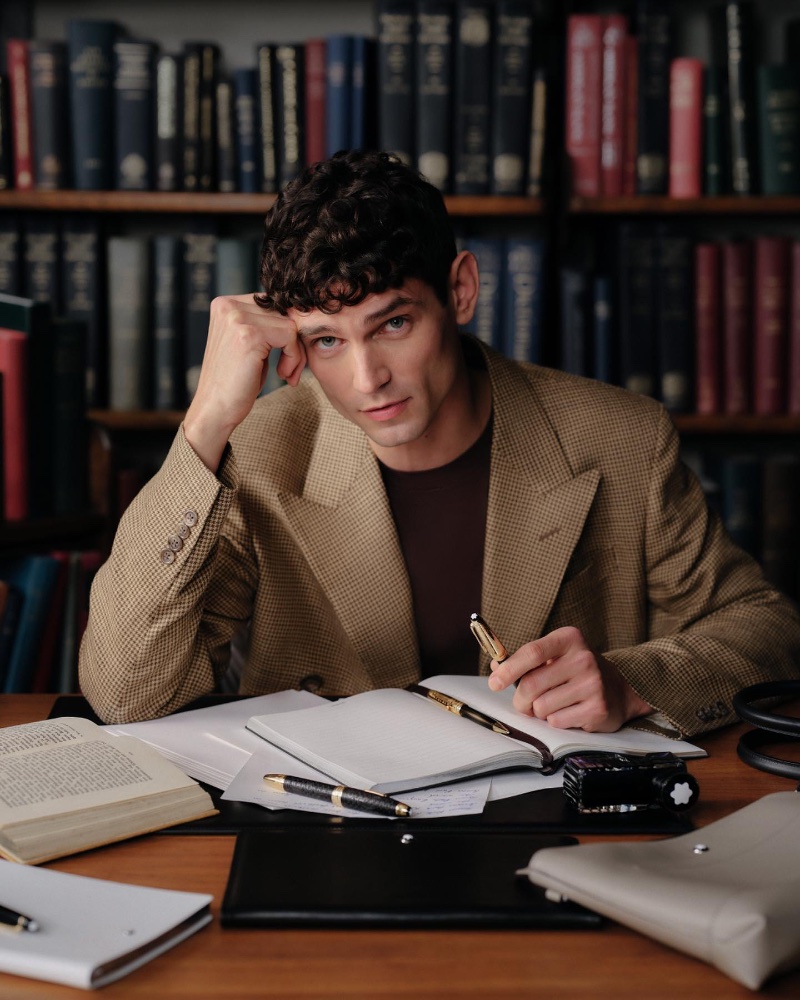 Arthur Gosse appears in the Montblanc The Library Spirit campaign, showcasing the brand's Meisterstück Around The World in 80 Days Doué Classique collection. 