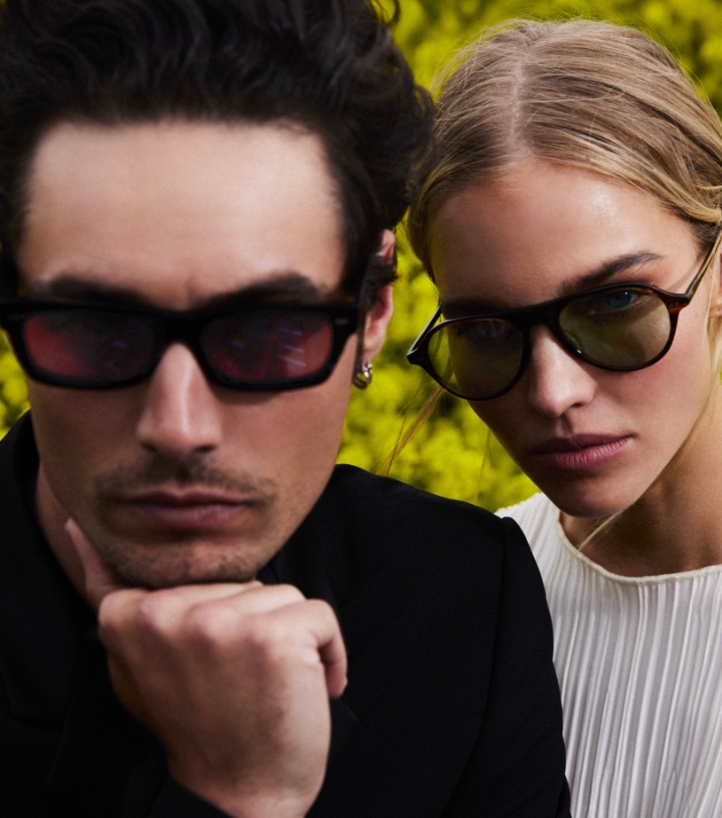 Pictured alongside Sasha Luss, Levi Dylan wears Oliver Peoples' Davri sunglasses for its summer 2023 campaign.