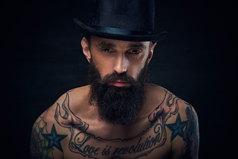 Tattoo Ideas for Men Love is Revolution Chest Tattoo