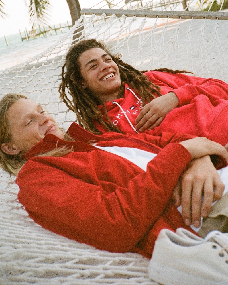Laying on a hammock, Luke Champion and Solly Wilson appear in Tommy Hilfiger's summer 2023 campaign.
