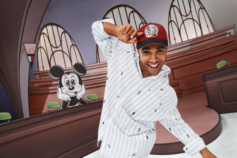 Lucien Laviscount rocks a striped Mickey Mouse short set for the Disney x Tommy collection campaign. 