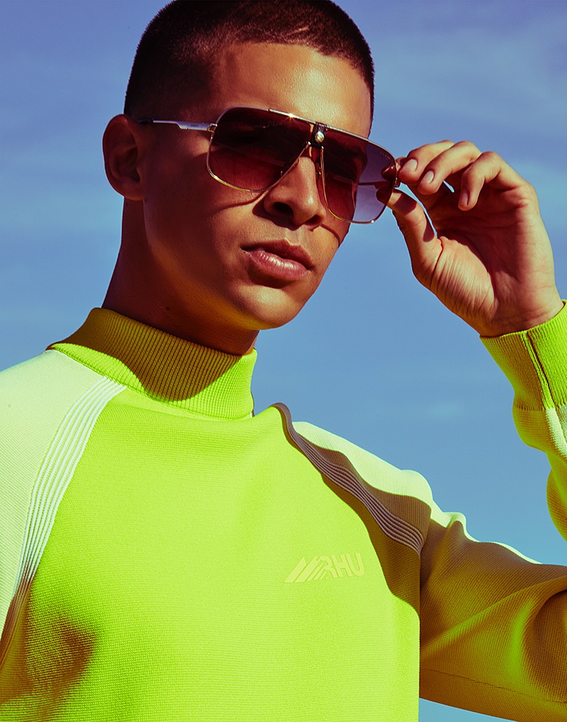 Tony wears knit mock turtleneck Zara x Rhuigi Villaseñor and sunglasses Carrera.