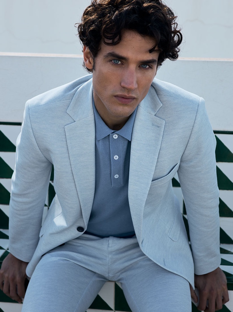 Federico Novello models a summer weight suit with a polo for ZWICKER. 