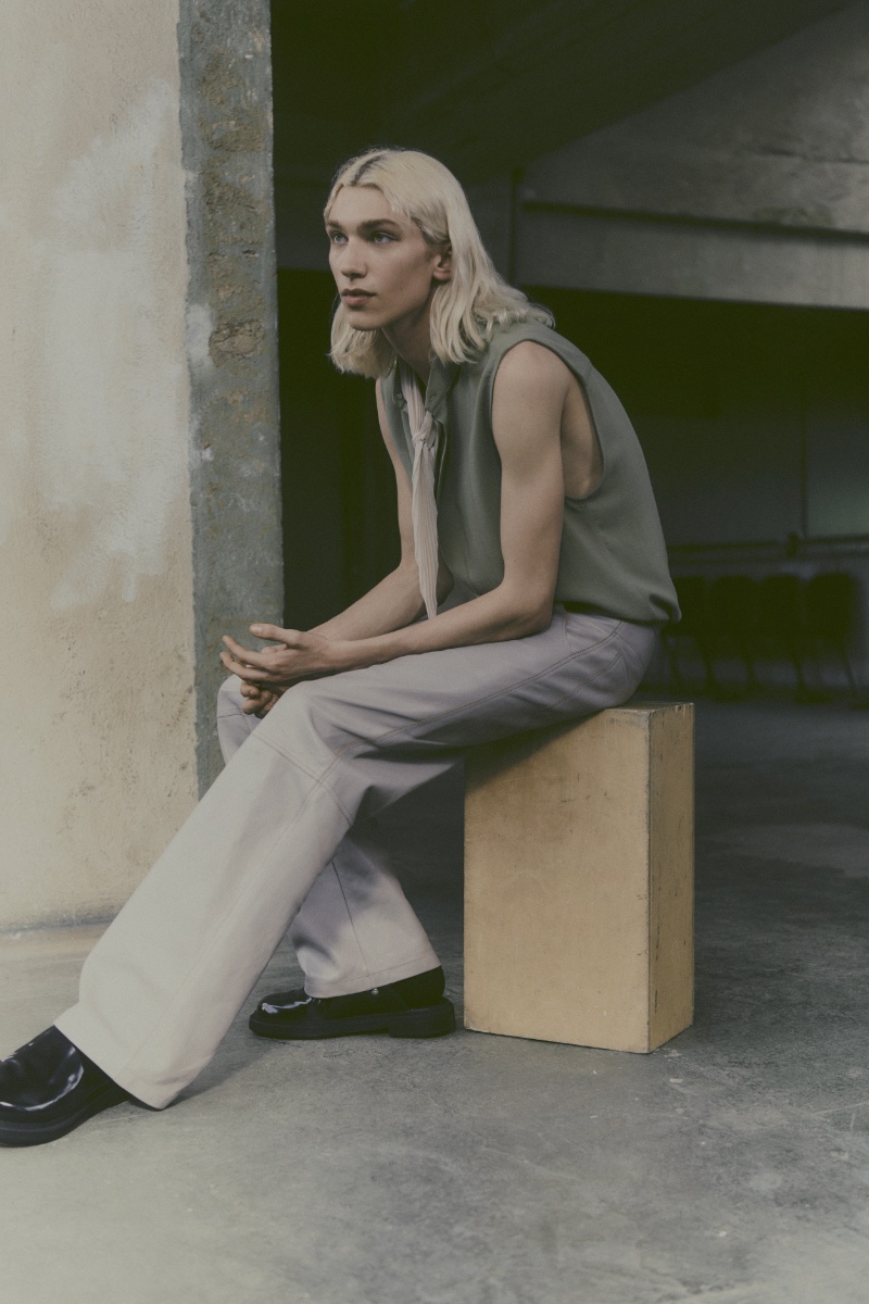 Noah Hanes embraces minimalist style in a sleeveless top from AMI's spring-summer 2024 collection.