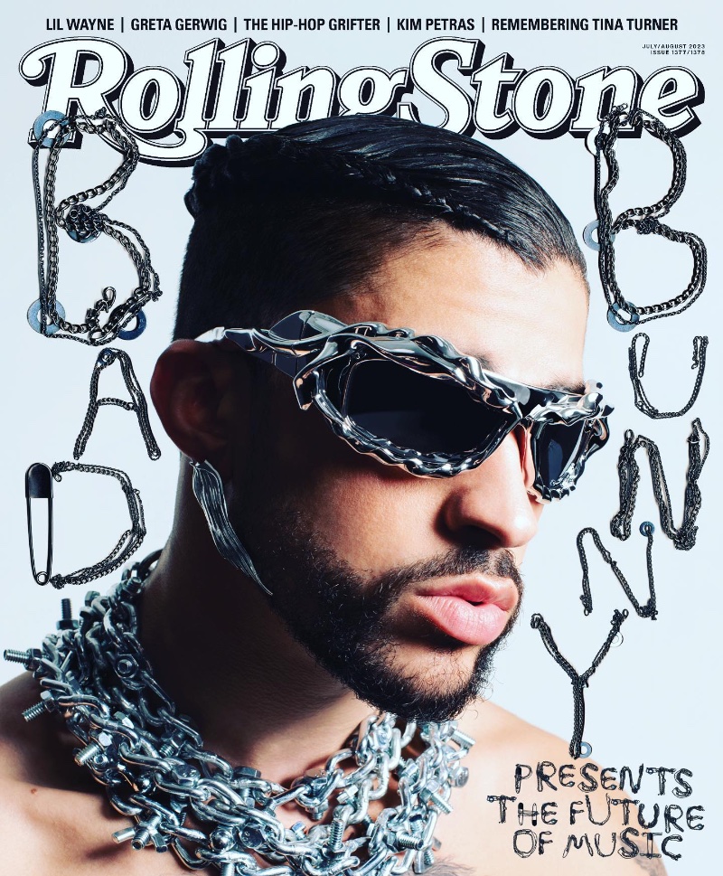 Covering Rolling Stone magazine, Bad Bunny wears Xtended Identity wing earrings with Ottolinger twisted sunglasses and Apt.1007 necklaces.