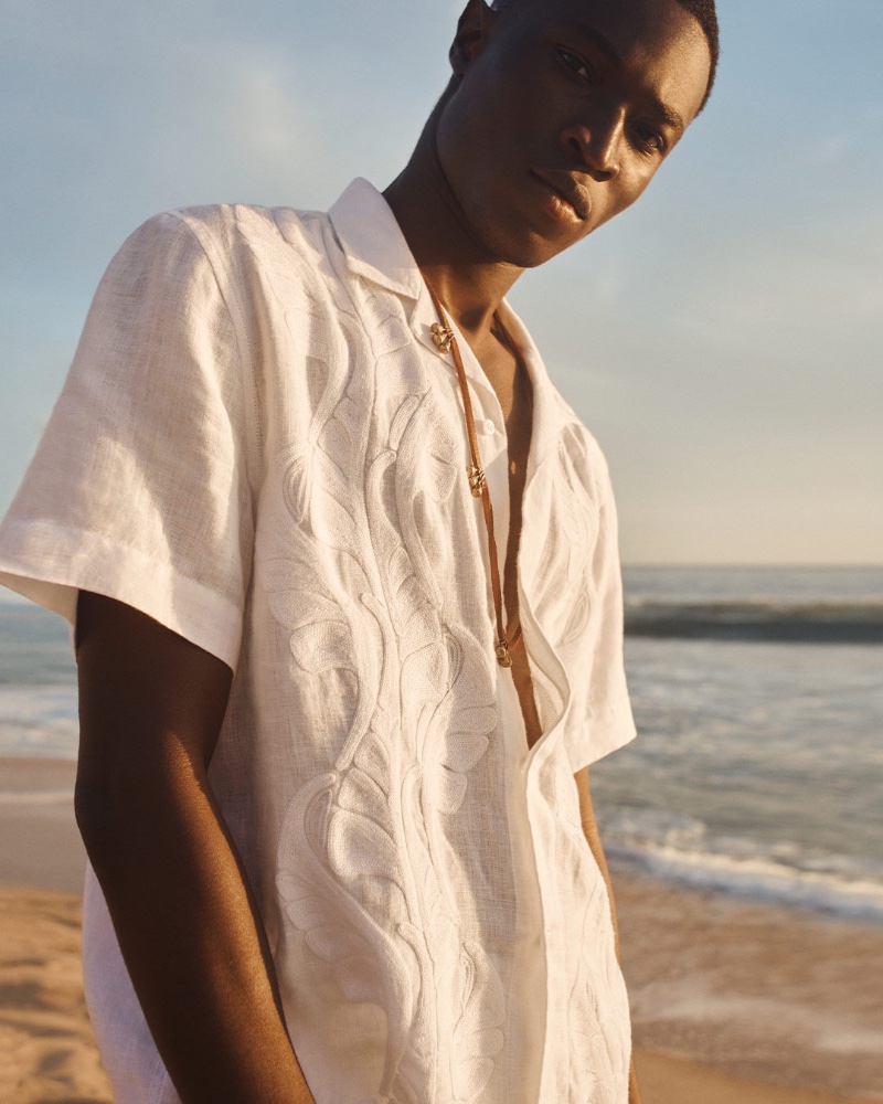 Taking the spotlight for Banana Republic's summer 2023 campaign, Kwaku Ansong dons the brand's Botanica Embroidered Resort shirt. 