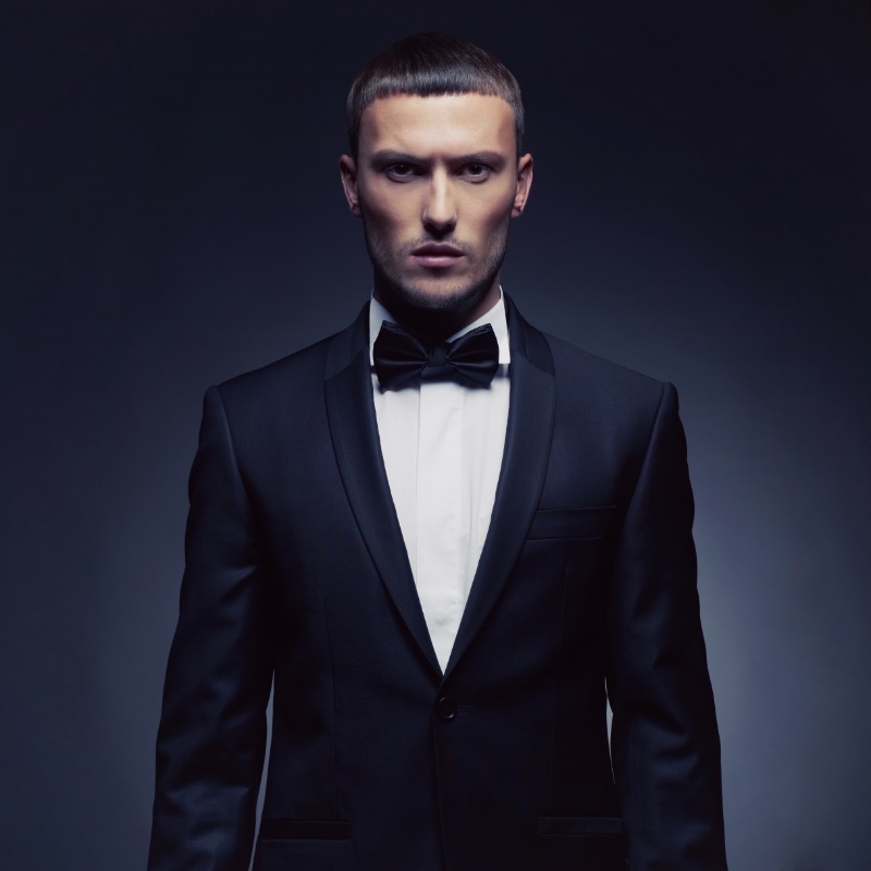 Modern black tie attire for men features tuxedos and dinner jackets.