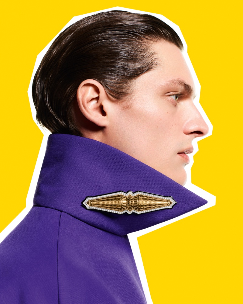Valentin Caron wears a brooch from the Boucheron Carte Blanche, More is More, High jewelry collection. 