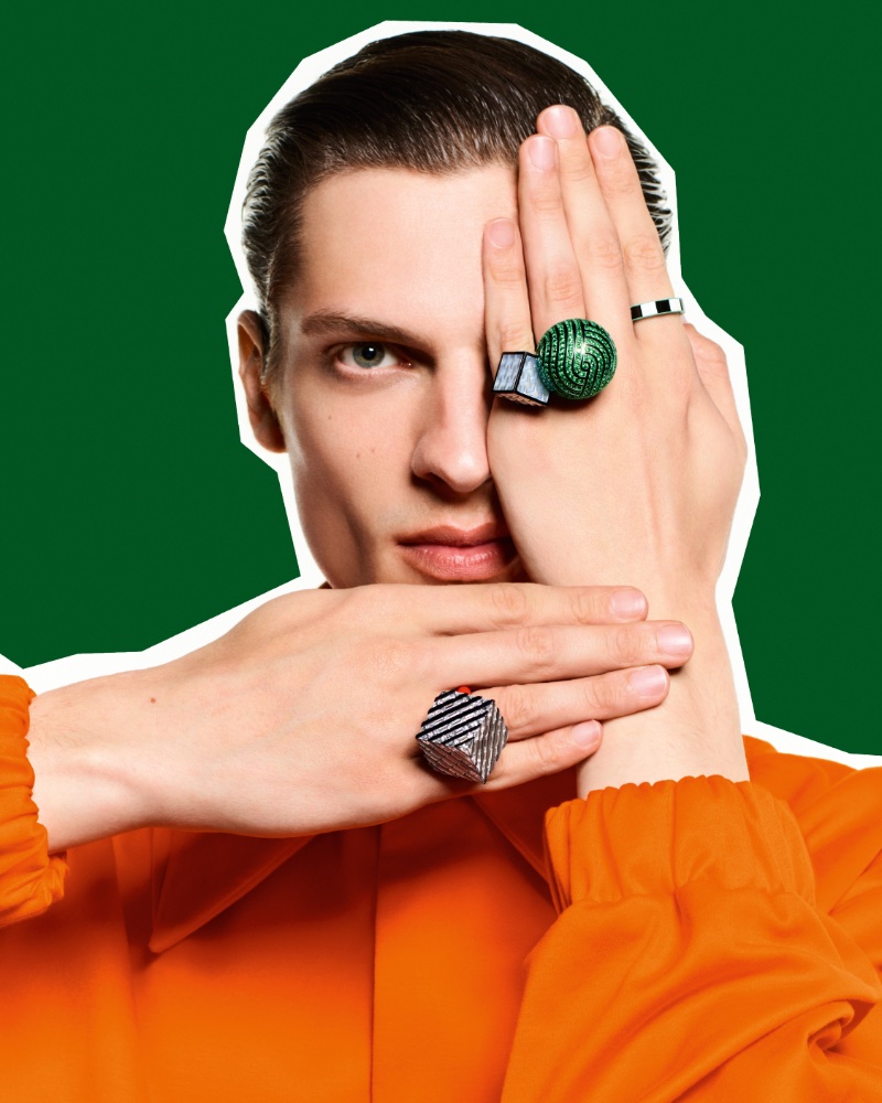 Valentin Caron wears graphic aerial rings from the Boucheron Carte Blanche, More is More, High jewelry collection.