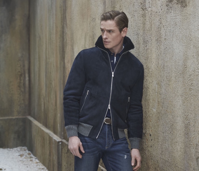 Patrick O'Donnell sports a shearling bomber jacket with jeans from Brunello Cucinelli's fall-winter 2023 collection for men. 