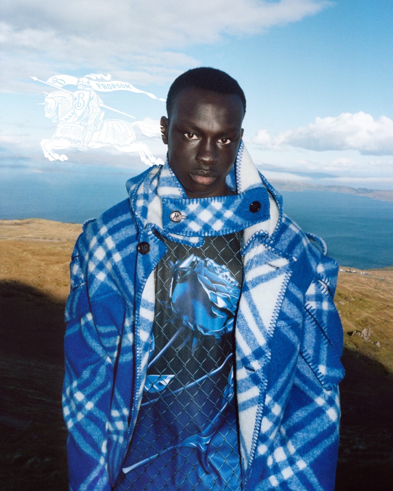 Paduey Luak makes a checked statement, appearing in Burberry's winter 2023 campaign. 