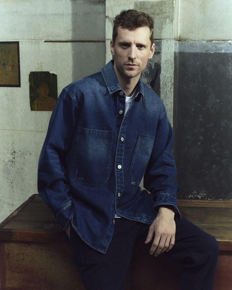 George Barnett wears a denim overshirt for DENHAM's fall-winter 2023 campaign.