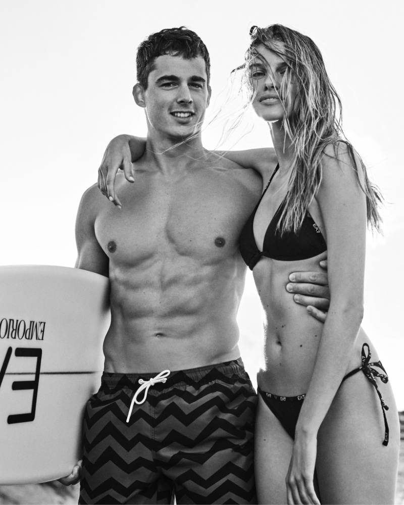 Models Pietro Boselli and Kim Riekenberg front the EA7 beachwear campaign.