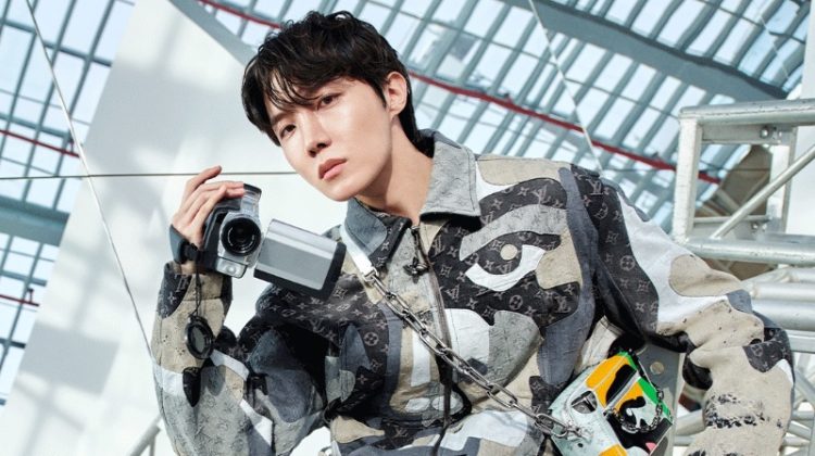 J-Hope sports a monogram print outfit for Louis Vuitton's fall-winter 2023 campaign.