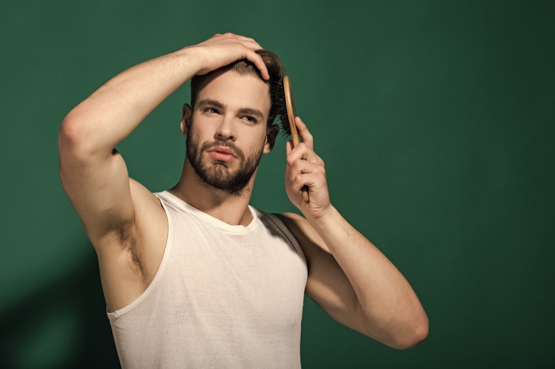 Man Brushing Hair