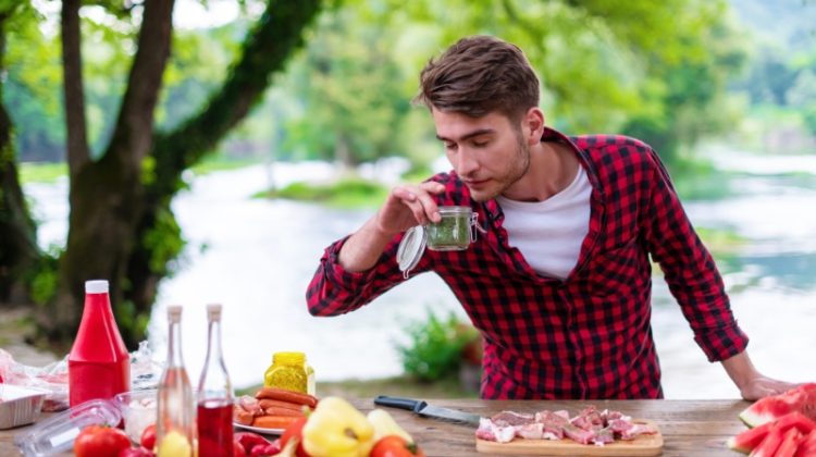 Man Cooking BBQ Outside