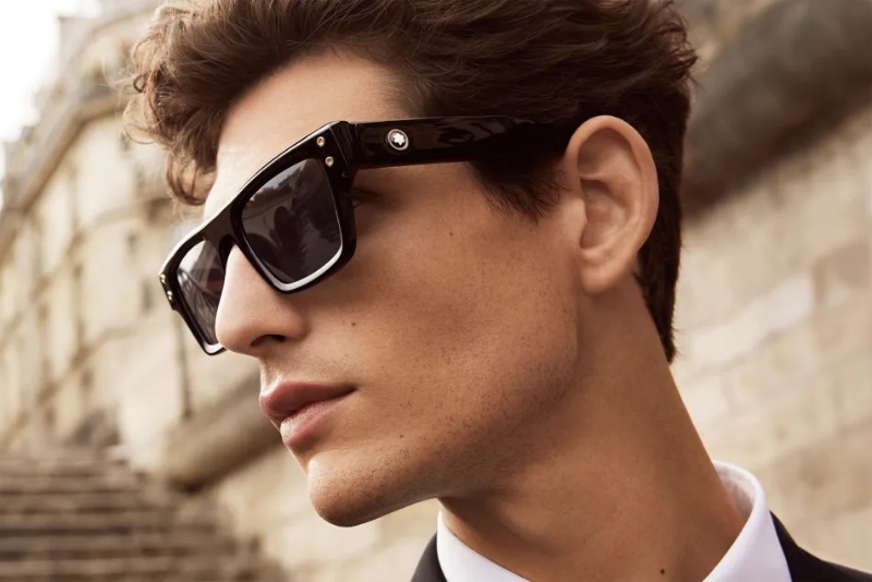 A sleek vision, Pau Ramis wears Montblanc logo-detail sunglasses. 