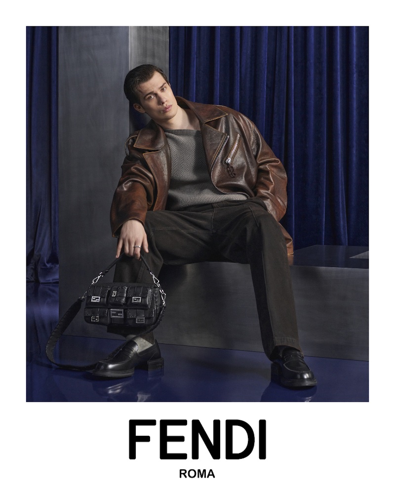 British actor Nicholas Galitzine rocks a brown leather jacket for Fendi's fall-winter 2023 campaign.