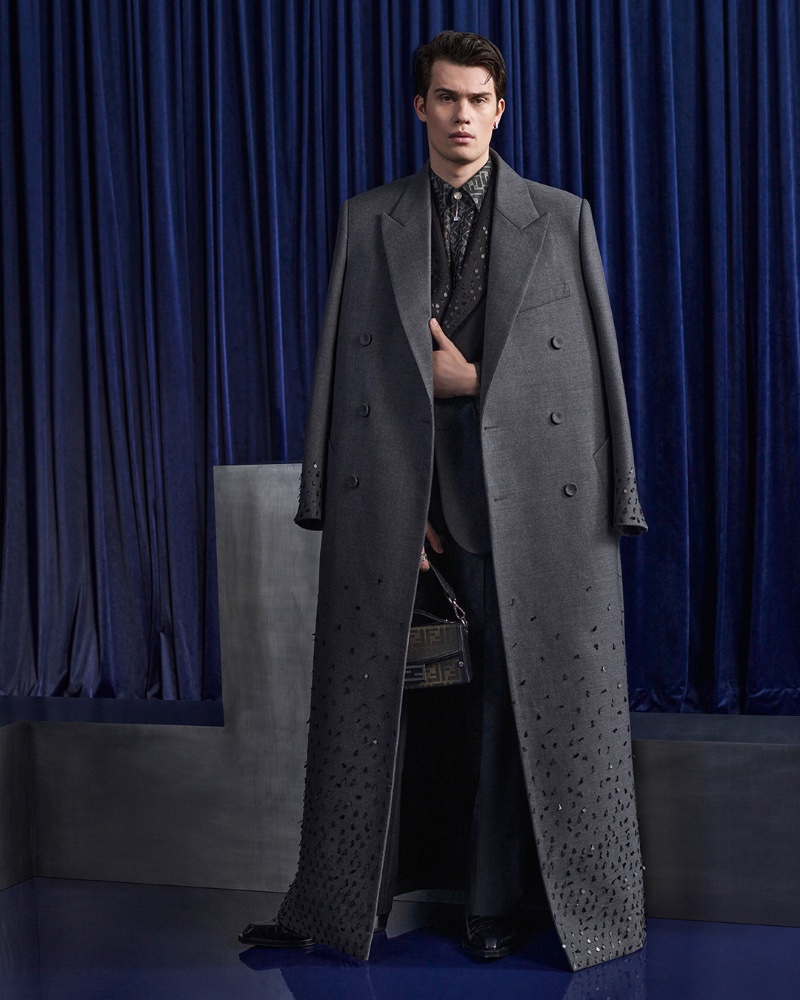 Nicholas Galitzine dons a double-breasted coat for Fendi's fall-winter 2023 campaign. 