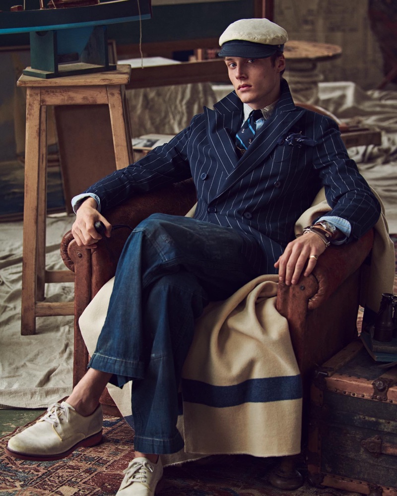 Hugh Laughton-Scott dons a double-breasted pinstripe jacket with denim jeans from the Polo Originals Regatta collection.
