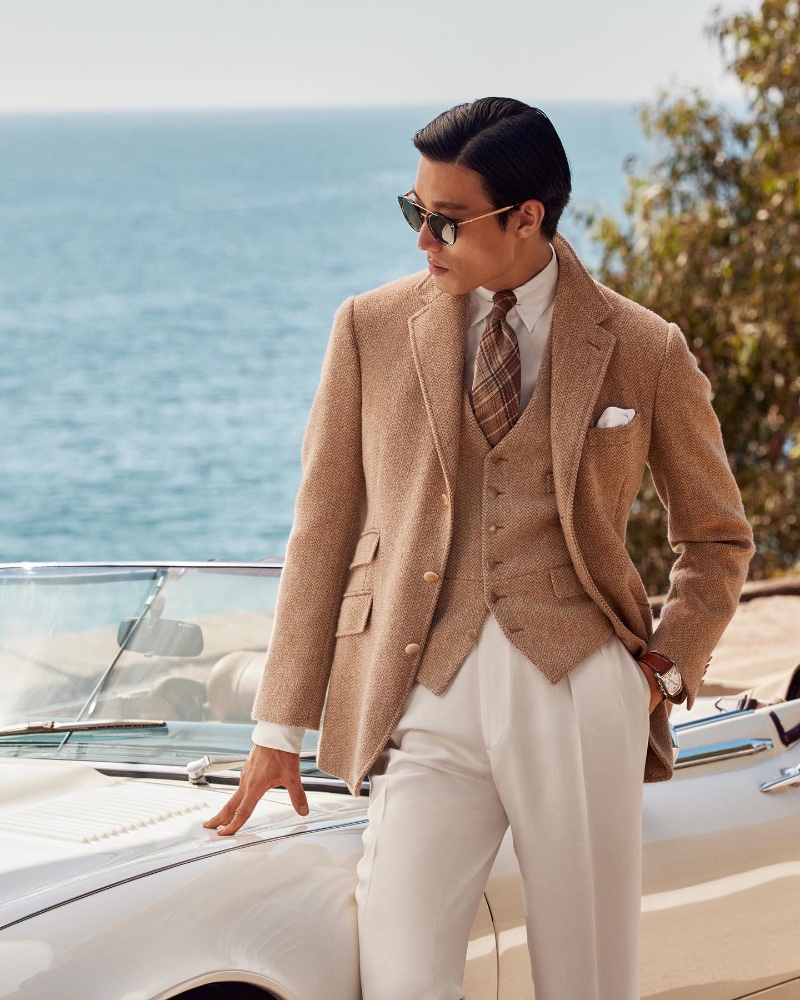 Juhyung Kang wears a herringbone sport coat and vest from Ralph Lauren Purple Label. 