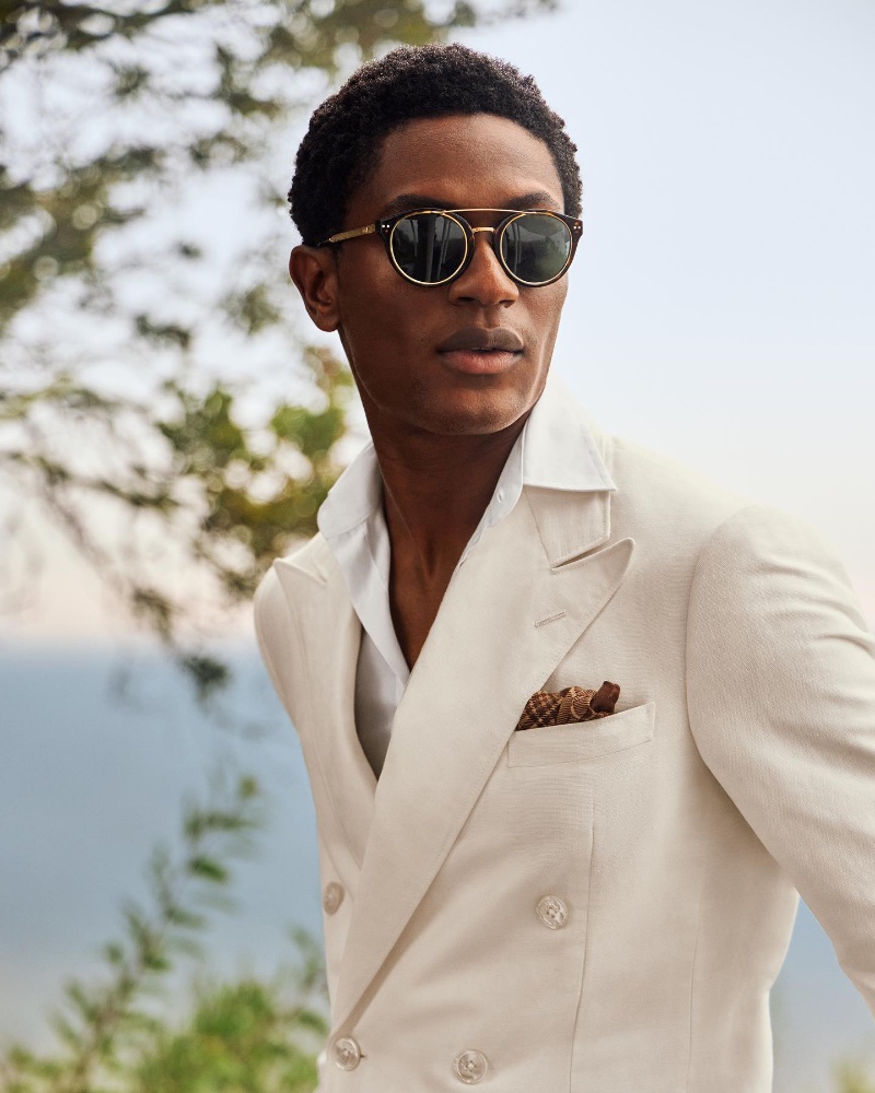 Hamid Onifade dons a chic double-breasted jacket by Ralph Lauren.