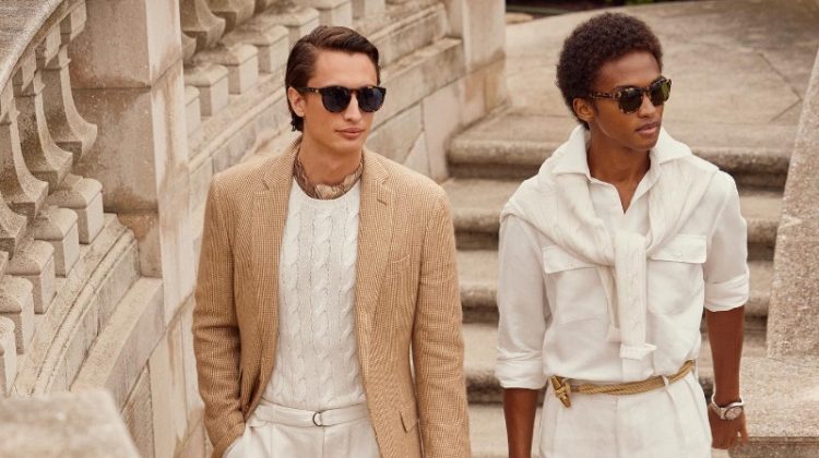 Models James Turlington and Stan Taylor wear chic, neutral-colored looks from the Ralph Lauren spring-summer 2023 collection.