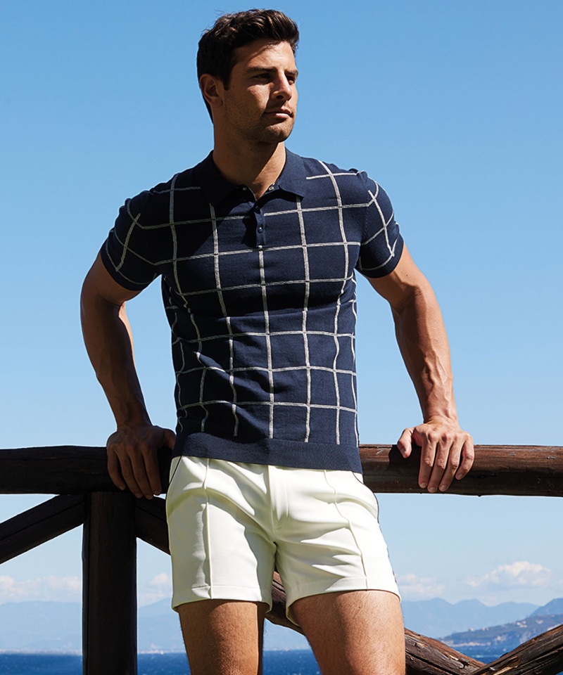 A chic vision, Franky Cammarata sports a fitted polo with pleated shorts from Ron Dorff.