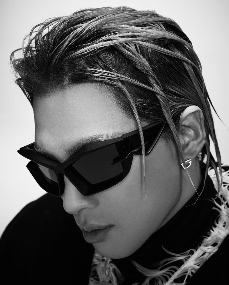 Taeyang rocks D-Frame nylon sunglasses for Givenchy's fall-winter 2023 campaign.