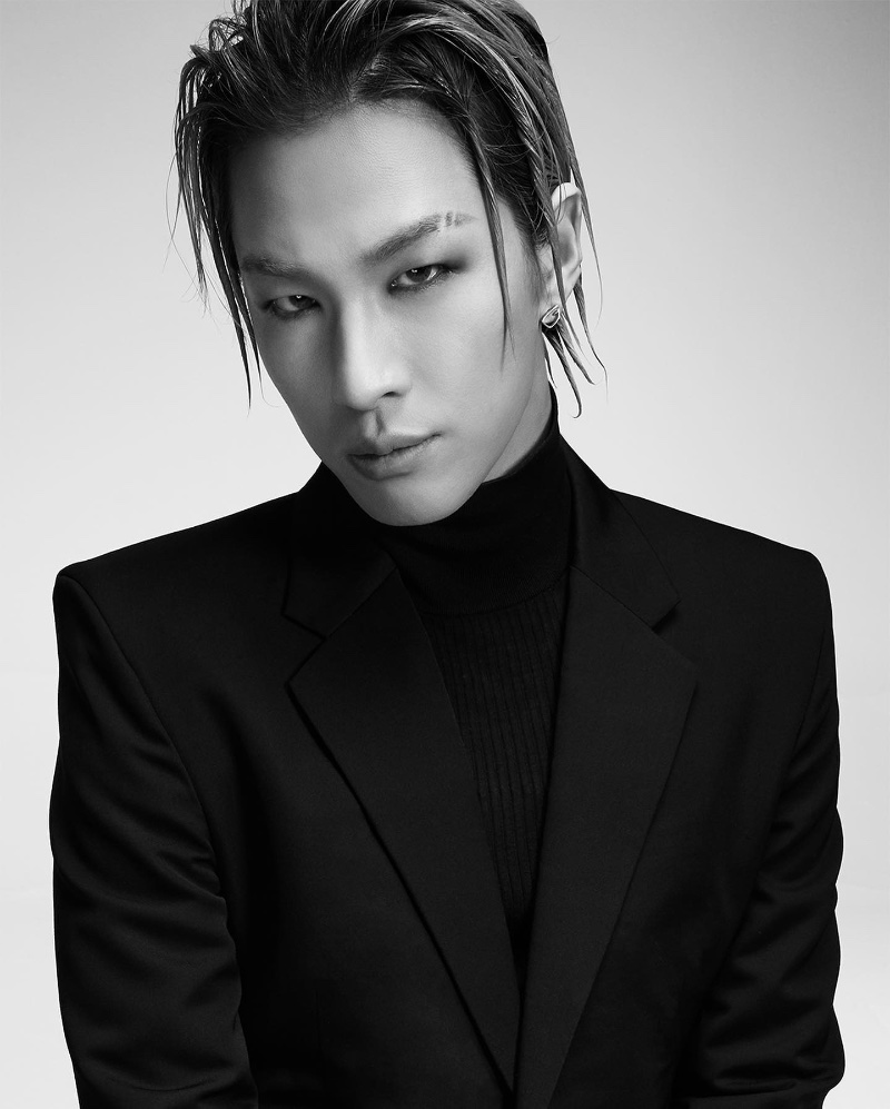 Ready for his close-up, Taeyang dons a turtleneck and blazer for Givenchy's fall-winter 2023 campaign.