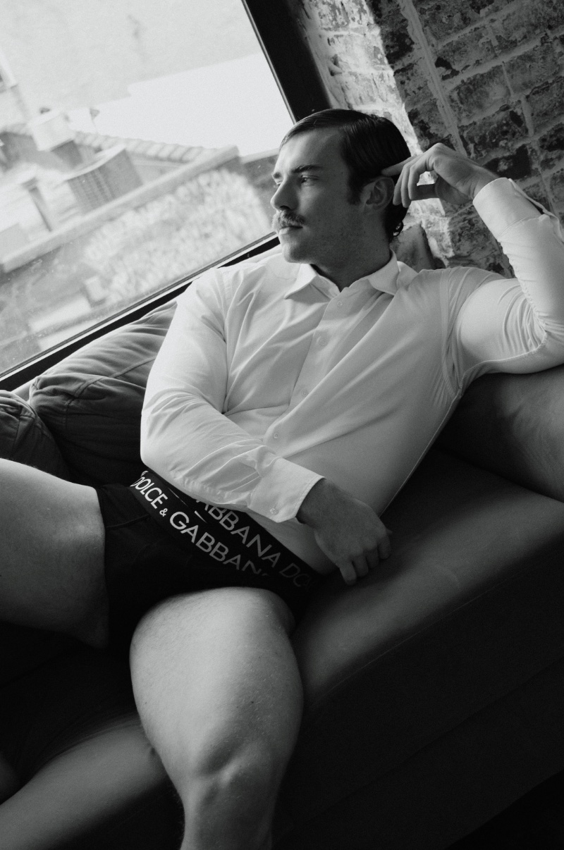 Wearing Dolce & Gabbana underwear, Zane Phillips also sports a Giorgio Armani shirt.