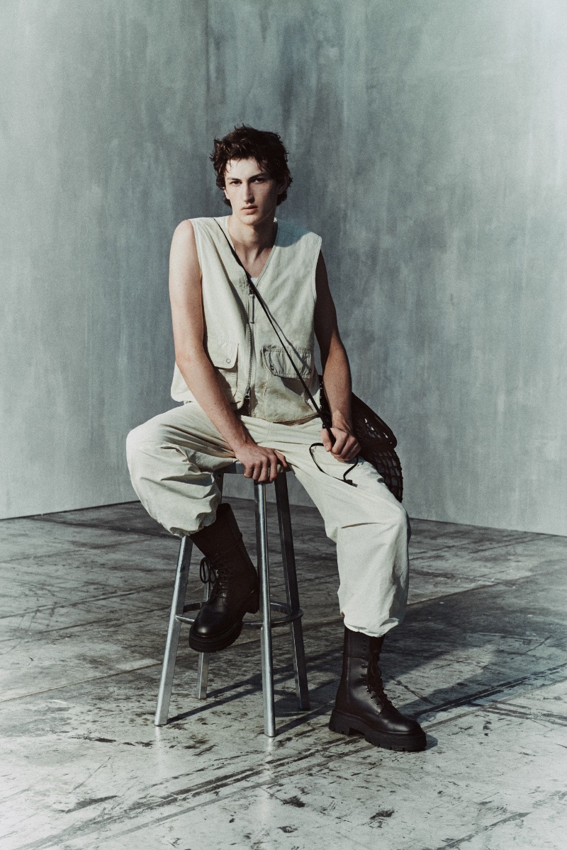 Vasko Luyckx rocks a monochromatic vest and pants with chunky leather boots from the Zara Edition fall 2023 collection.